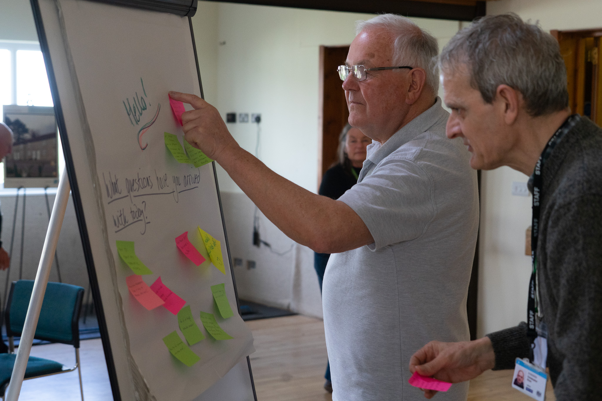 Martin and Chris Khan reviewing questions raised during the day at DCRF conference