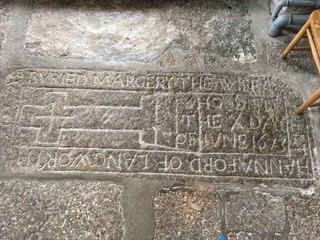 inscription in widecombe village church floor