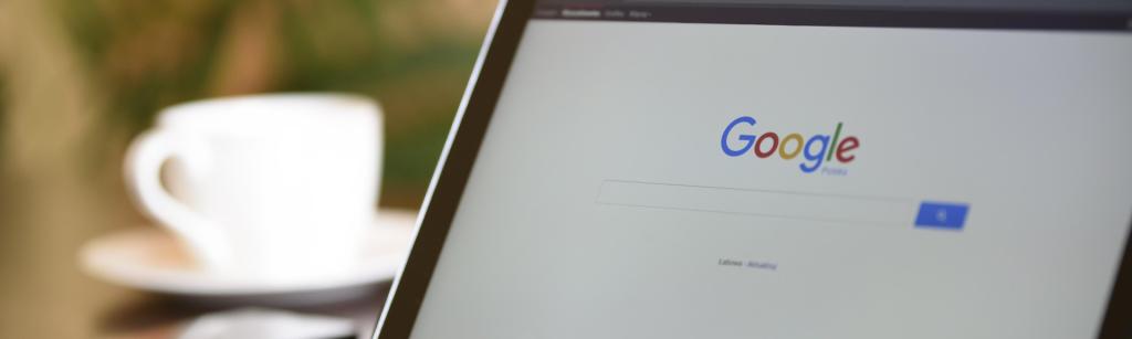 Tablet with a Google home page showing