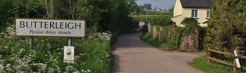 Road sign and country road
