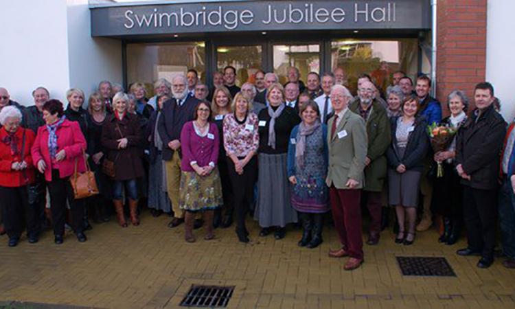 People standing outside Swimbridge village hall