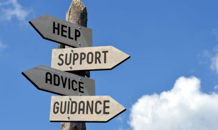 Sign Post with Help, Support, Advice and Guidance in different directions