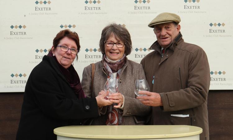 Elaine Cook, CEO of  Devon Communities Together with Garth and Ann Brooks, owners of Golden Sunrise